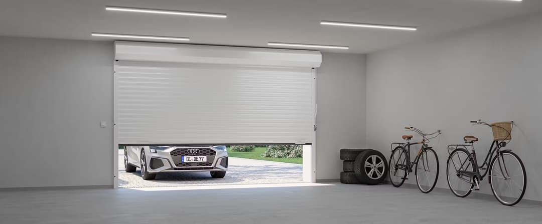Installation de porte de garage enroulable